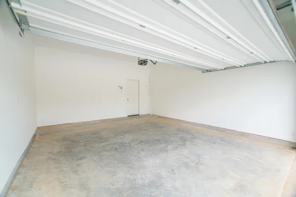 a house view with swimming pool in front of it