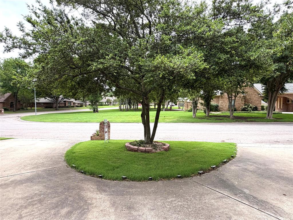 2020 Arbor Bend Road Bonham, TX 75418 - Photo 40 of 40 Concrete driveway entrance with integrated ground lighting