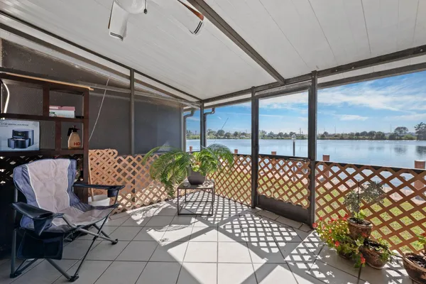 a view of balcony with furniture