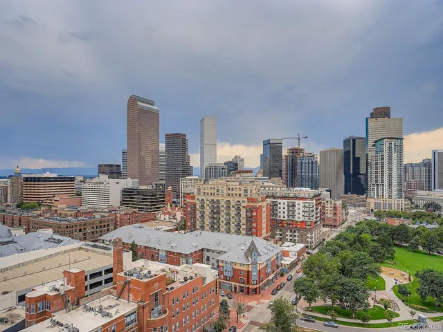 a city view with tall buildings