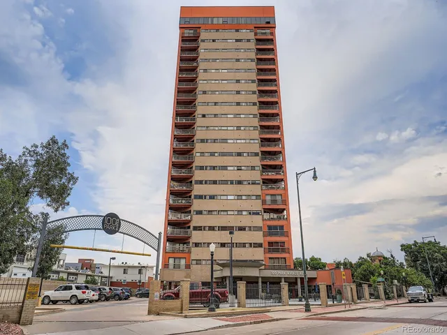a view of a building with a street