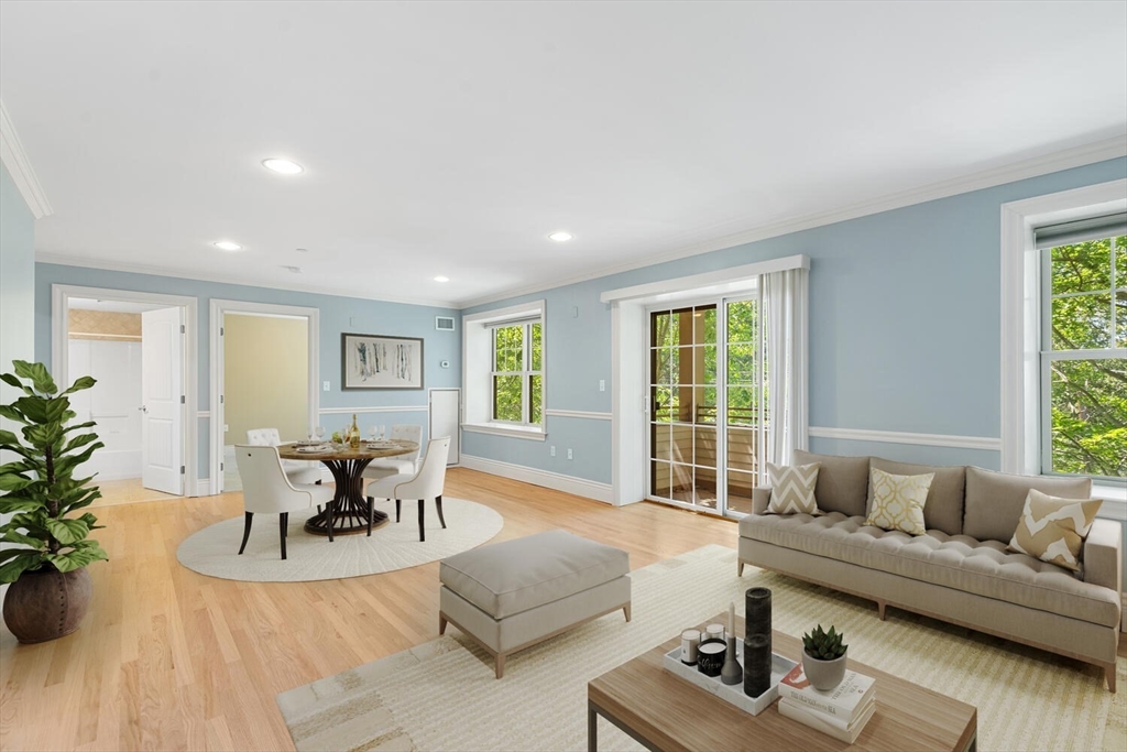 12 Russell Road, Unit 303 Wellesley, MA 02482 - Photo 3 of 28 a living room with furniture and a large window