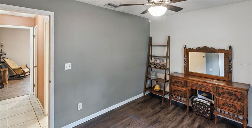 30911 Vista View Mount Dora, FL 32757 - Photo 25 of 54 a view of livingroom with furniture and wooden floor