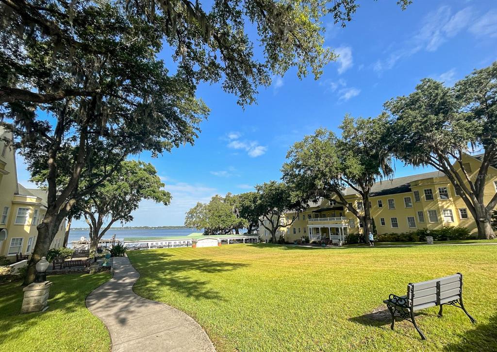 30911 Vista View Mount Dora, FL 32757 - Photo 51 of 54 a swimming pool with outdoor seating and yard