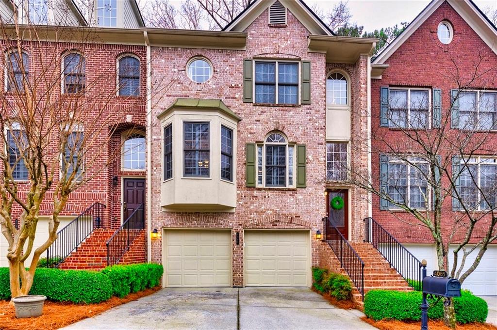 4065 Ivey Gate Atlanta, GA 30341 - Photo 1 of 1 a front view of a house with a yard