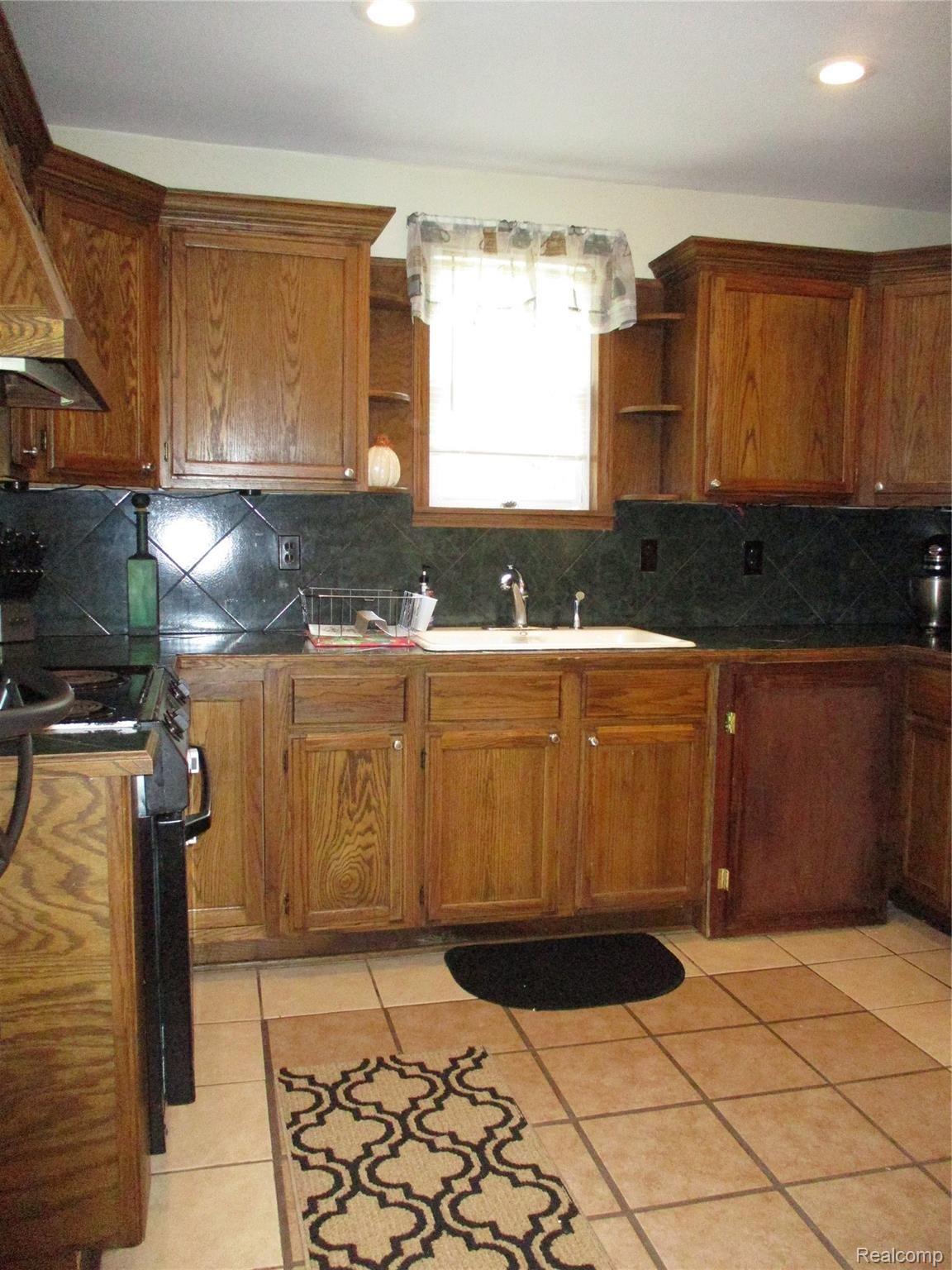19215 Inkster Road Livonia, MI 48152 - Photo 16 of 43 KITCHEN SINK AREA