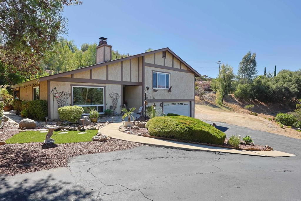 740 South Grade Road Alpine, CA 91901 - Photo 25 of 31 a view of a house with backyard and sitting area