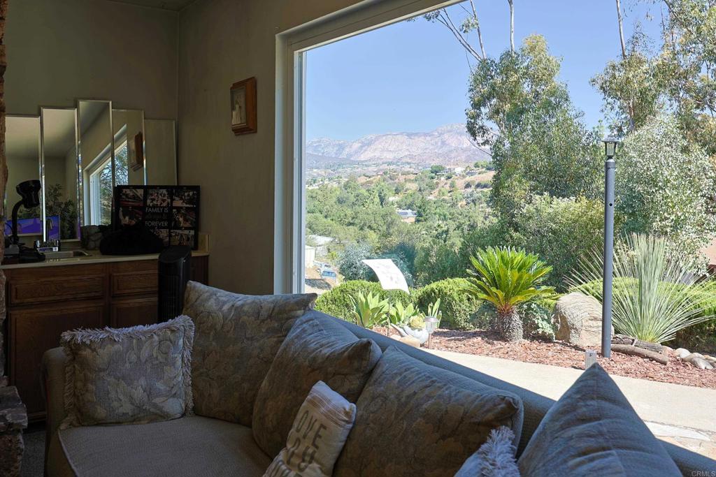 740 South Grade Road Alpine, CA 91901 - Photo 5 of 31 a living room with furniture and a large window