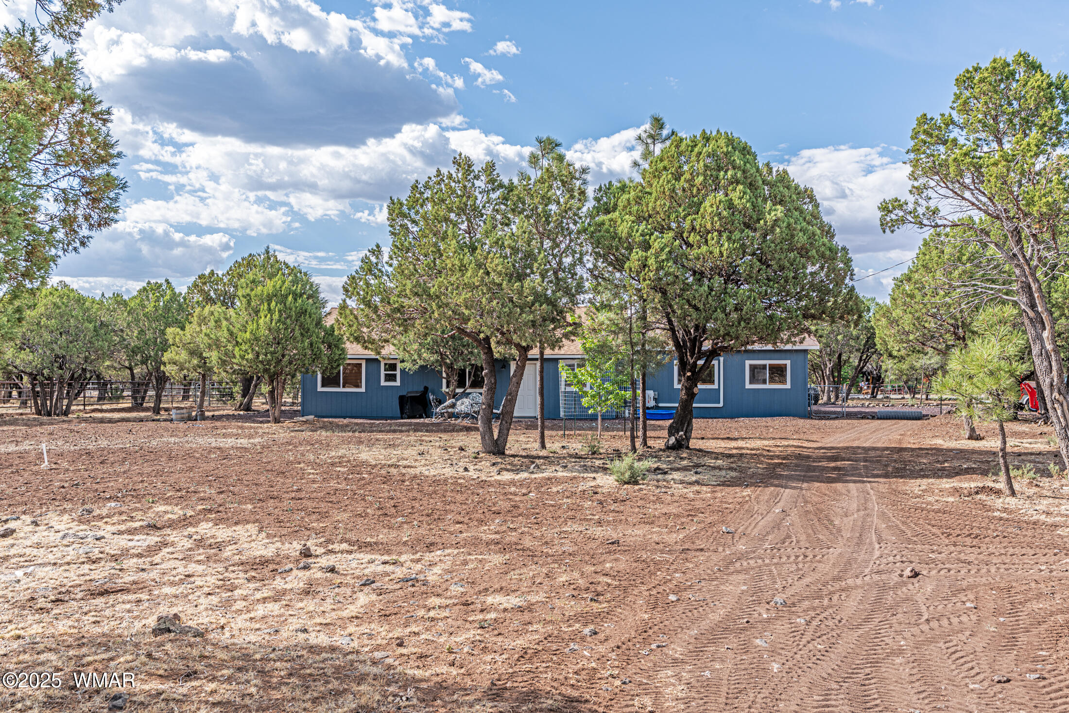 703 Backwoods Trail Lakeside, AZ 85929 - Photo 30 of 31 back property line view to the house