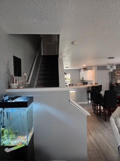 2013 Sea Front Court Clearwater, FL 33763 - Photo 12 of 17 a living room with furniture and a fireplace