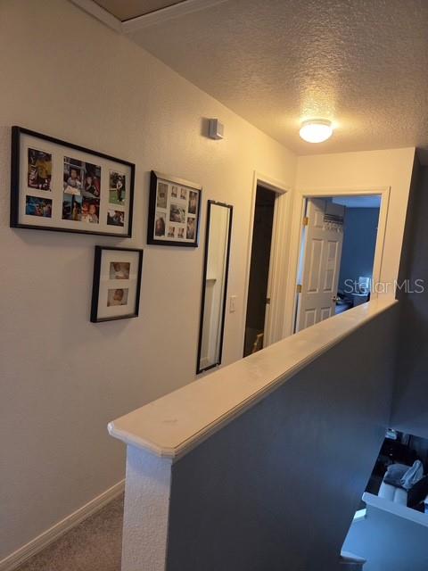 2013 Sea Front Court Clearwater, FL 33763 - Photo 13 of 17 a view of a hallway with workspace