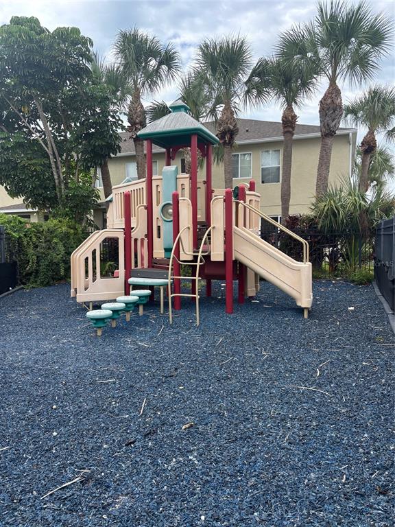 2013 Sea Front Court Clearwater, FL 33763 - Photo 17 of 17 a view of a house with a yard and sitting area
