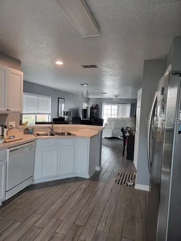 a large kitchen with a lot of counter space