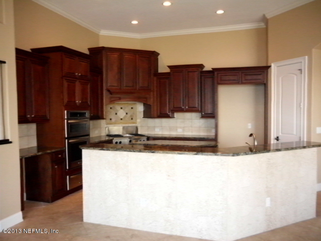 2124 Romeo Point Lane Fleming Island, FL 32003 - Photo 4 of 40 Kitchen from family rm