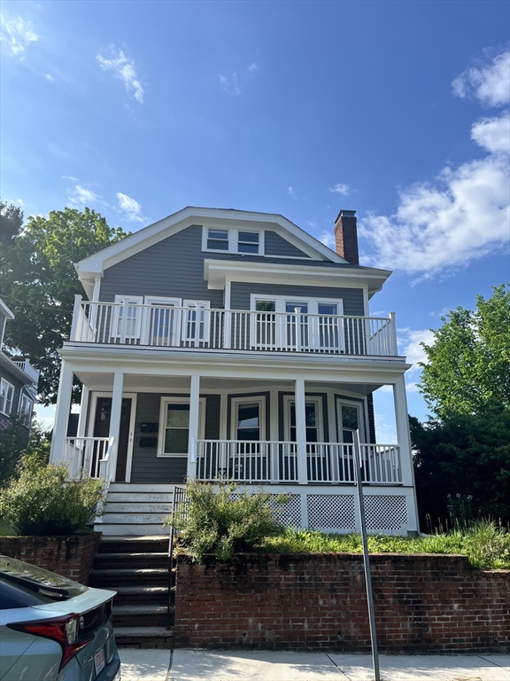 3 Chester Road, Unit 3 Belmont, MA 02478 - Photo 1 of 40 a front view of a house with a yard