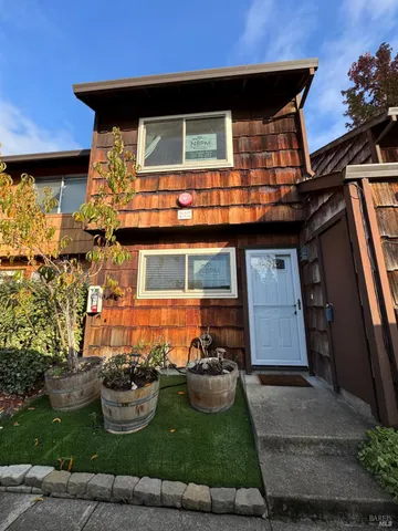 a view of entryway with a wooden floor