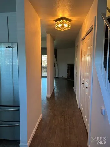 a kitchen with stainless steel appliances granite countertop a sink and a stove