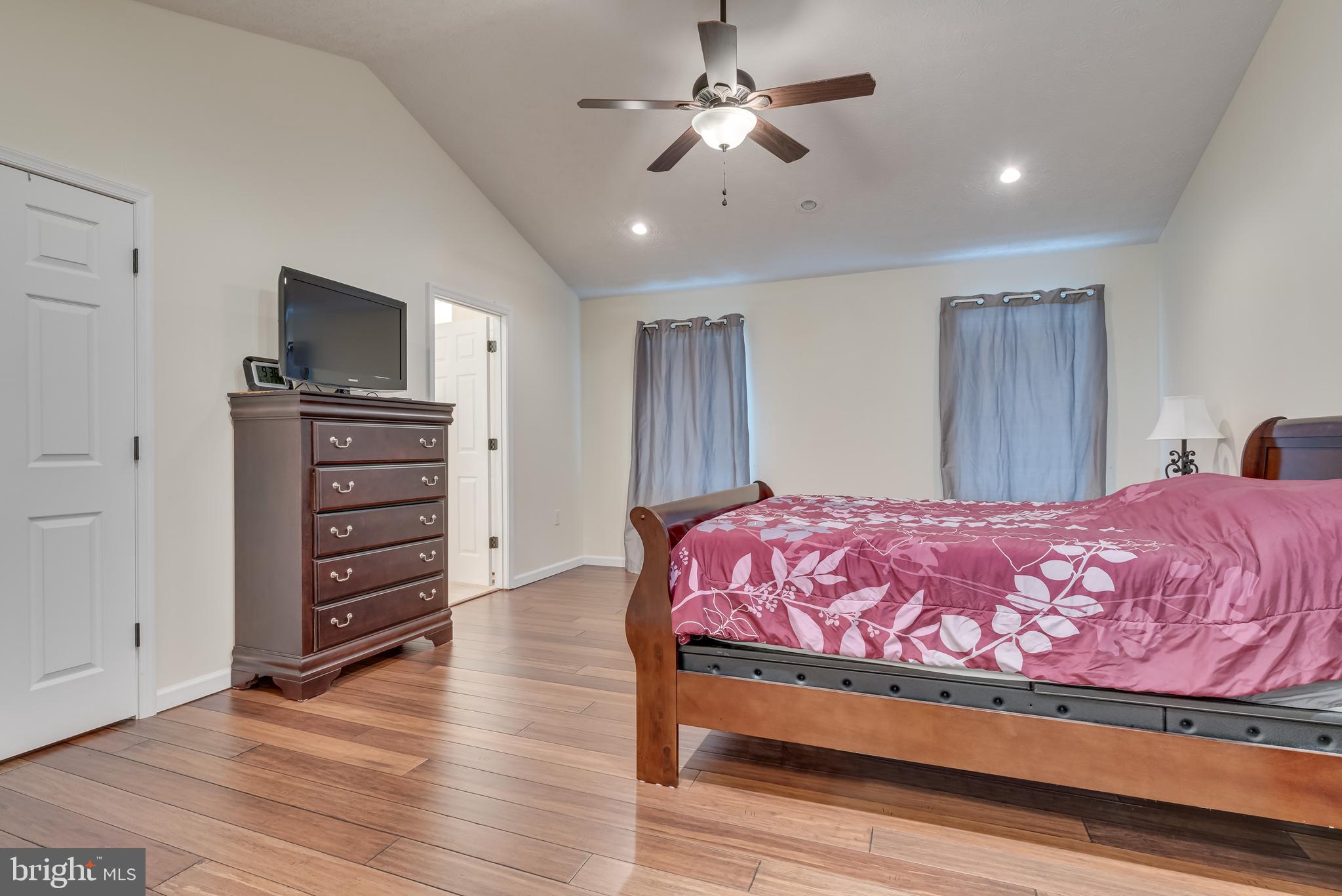 61 Torytown Road Bunker Hill, WV 25413 - Photo 24 of 57 Master bedroom measures 14.3 ft x 16.2ft features