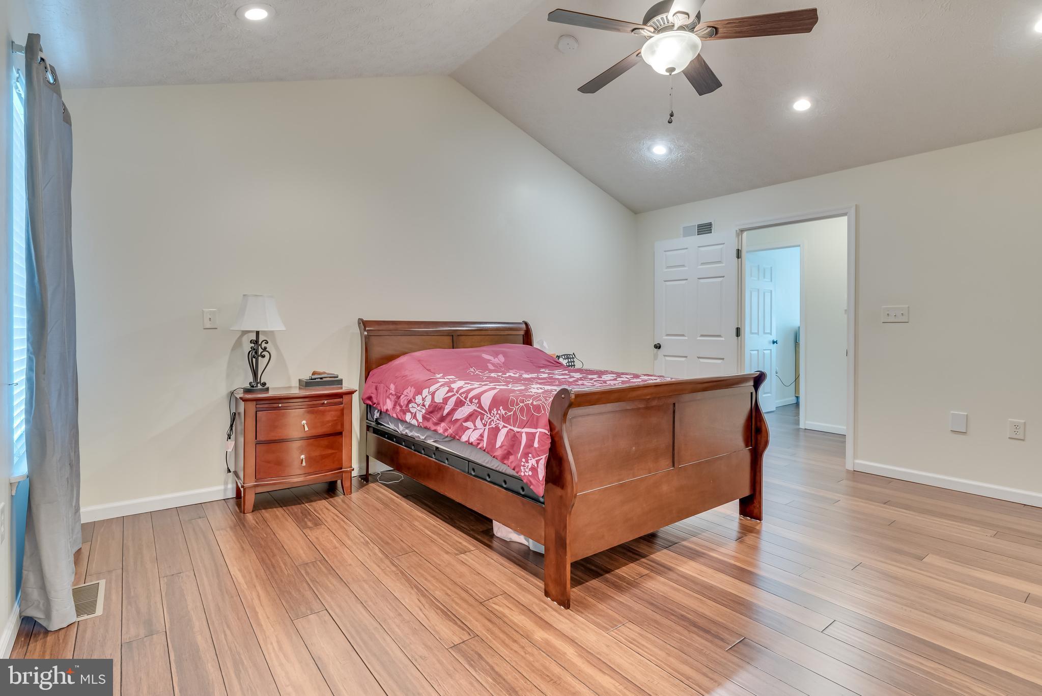 61 Torytown Road Bunker Hill, WV 25413 - Photo 25 of 57 Beautiful hardwood floors, cathedral ceiling,