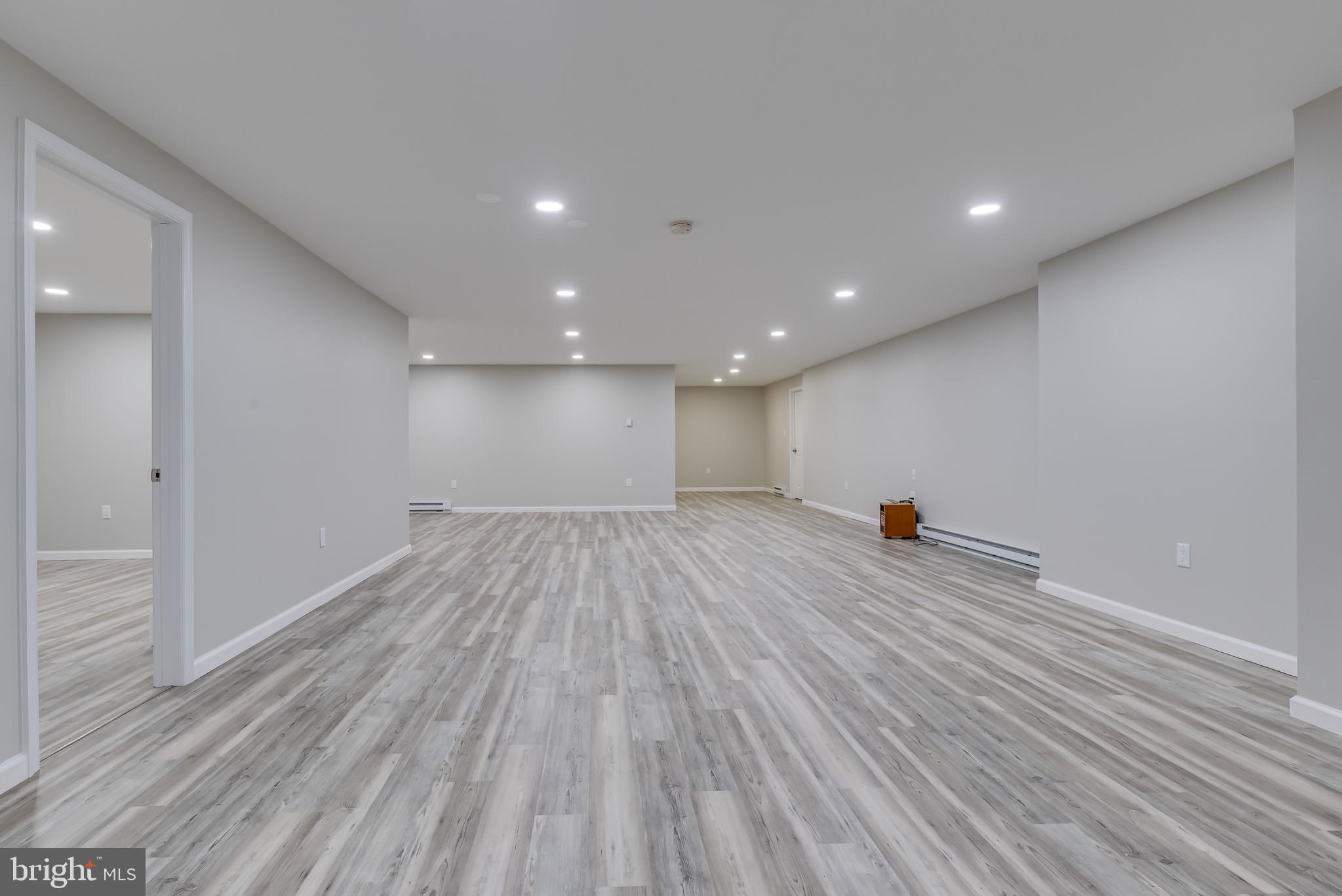 61 Torytown Road Bunker Hill, WV 25413 - Photo 36 of 57 Level rec room! Measuring 62 ft x 30 ft there s