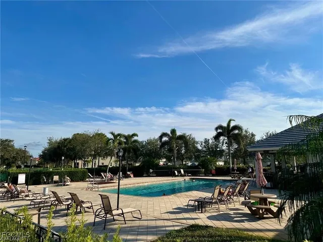 a view of yard with outdoor seating and green space