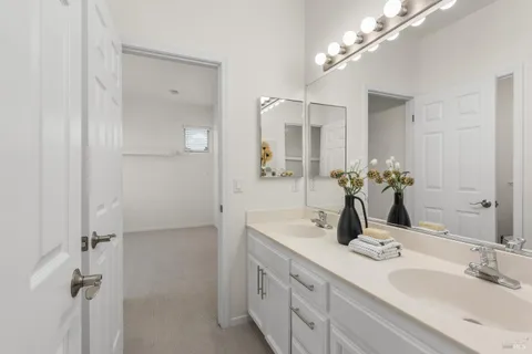 a white toilet sitting next to a shower curtain