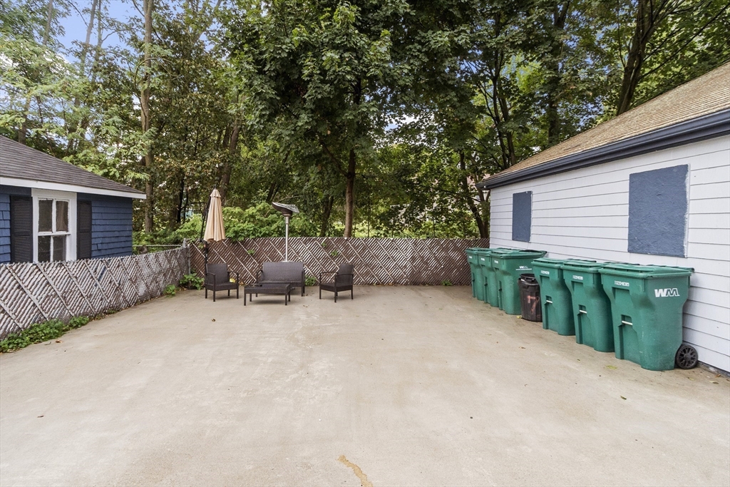 73 Dearborn Avenue, Unit 1 Lynn, MA 01905 - Photo 8 of 16 a view of a house with backyard and sitting area