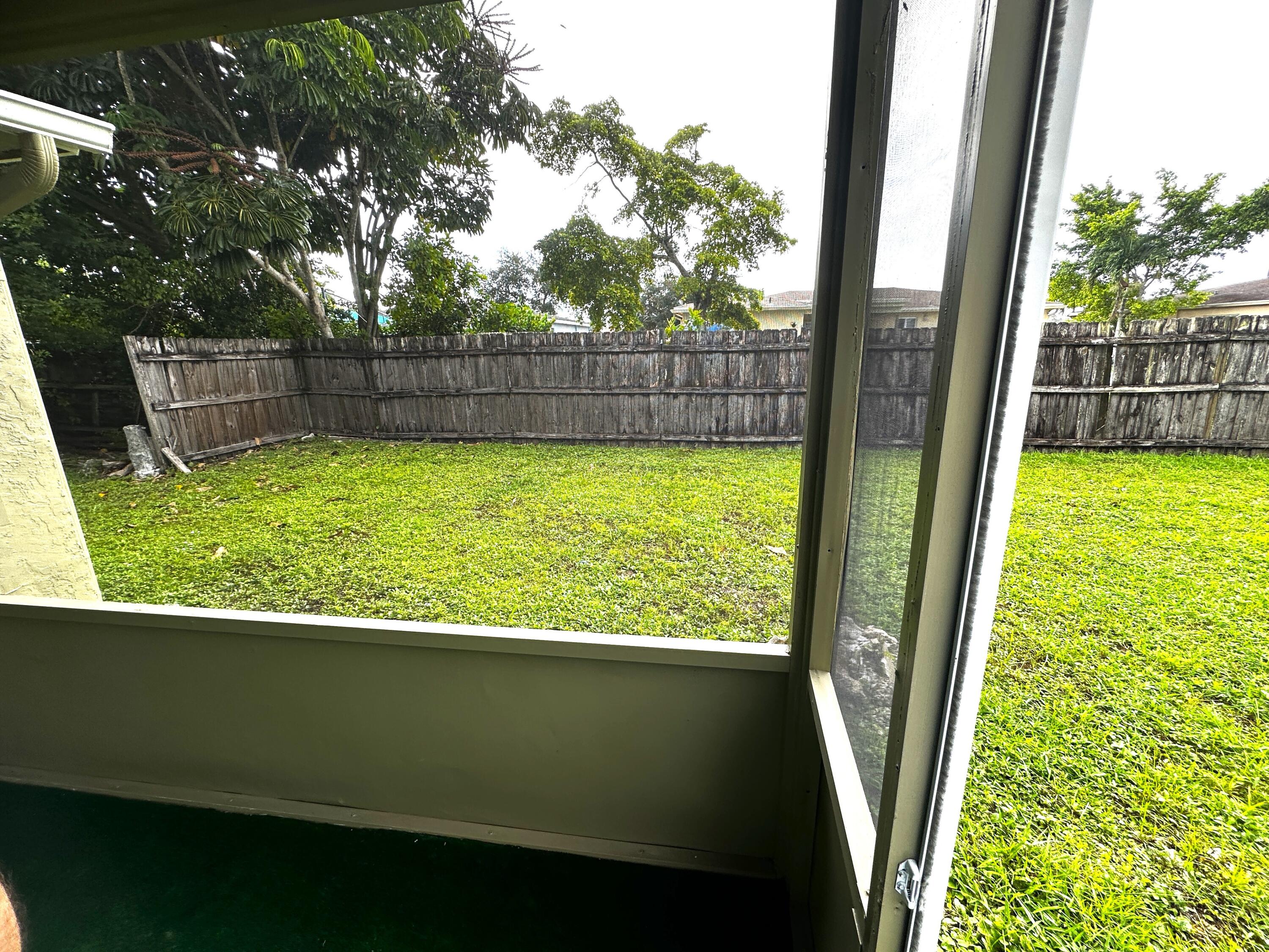 11150 Delta Circle Boca Raton, FL 33428 - Photo 14 of 17 a view of backyard from deck