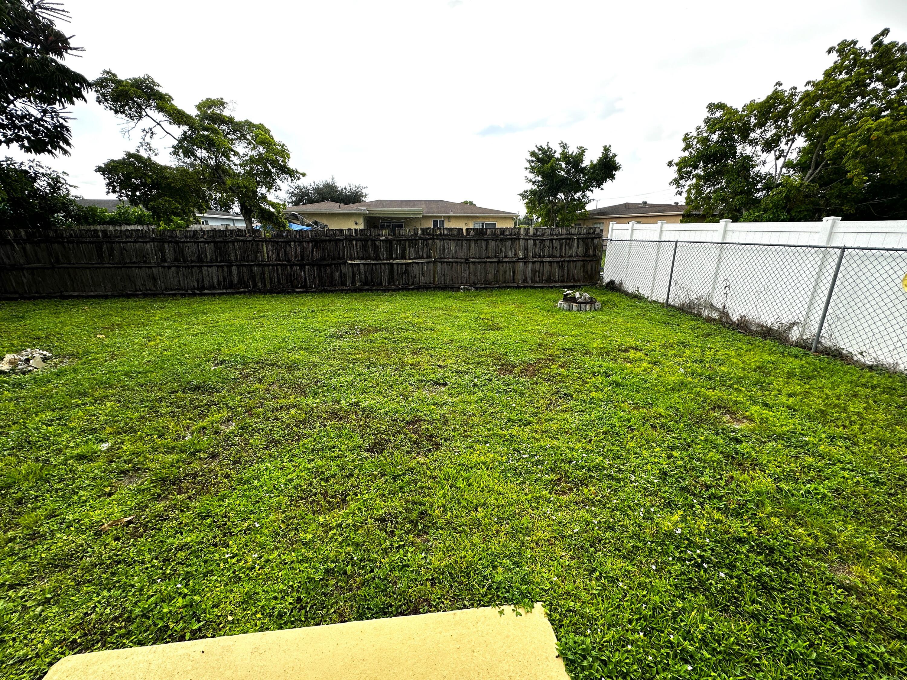 11150 Delta Circle Boca Raton, FL 33428 - Photo 17 of 17 a view of a backyard with a garden