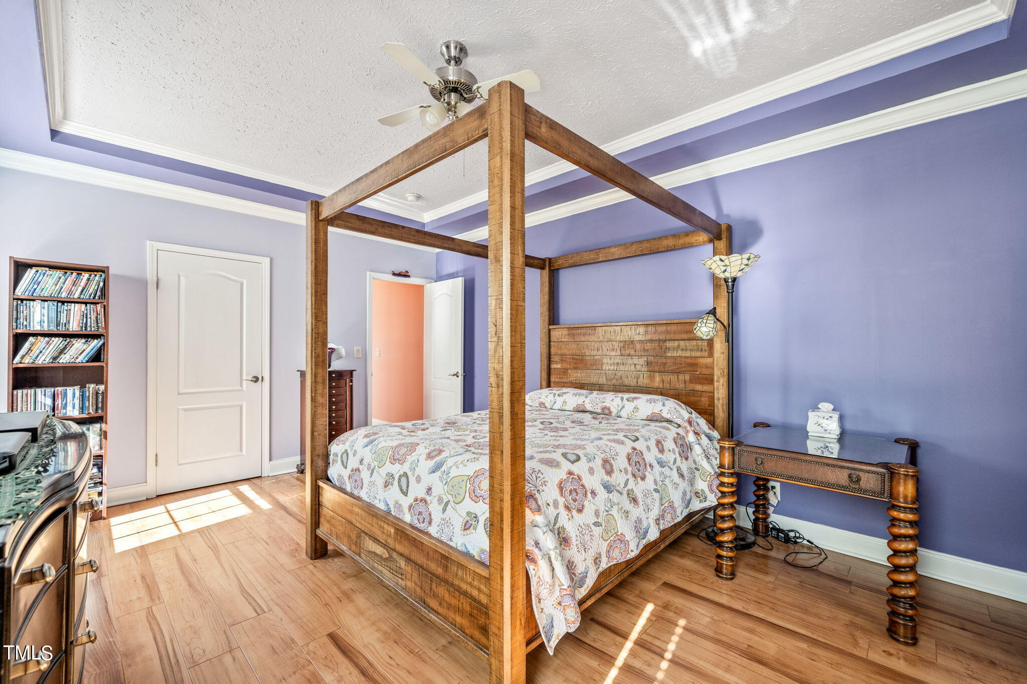 155 Esnon Road Chase City, VA 23924 - Photo 12 of 35 a bedroom with a bed and a chandelier