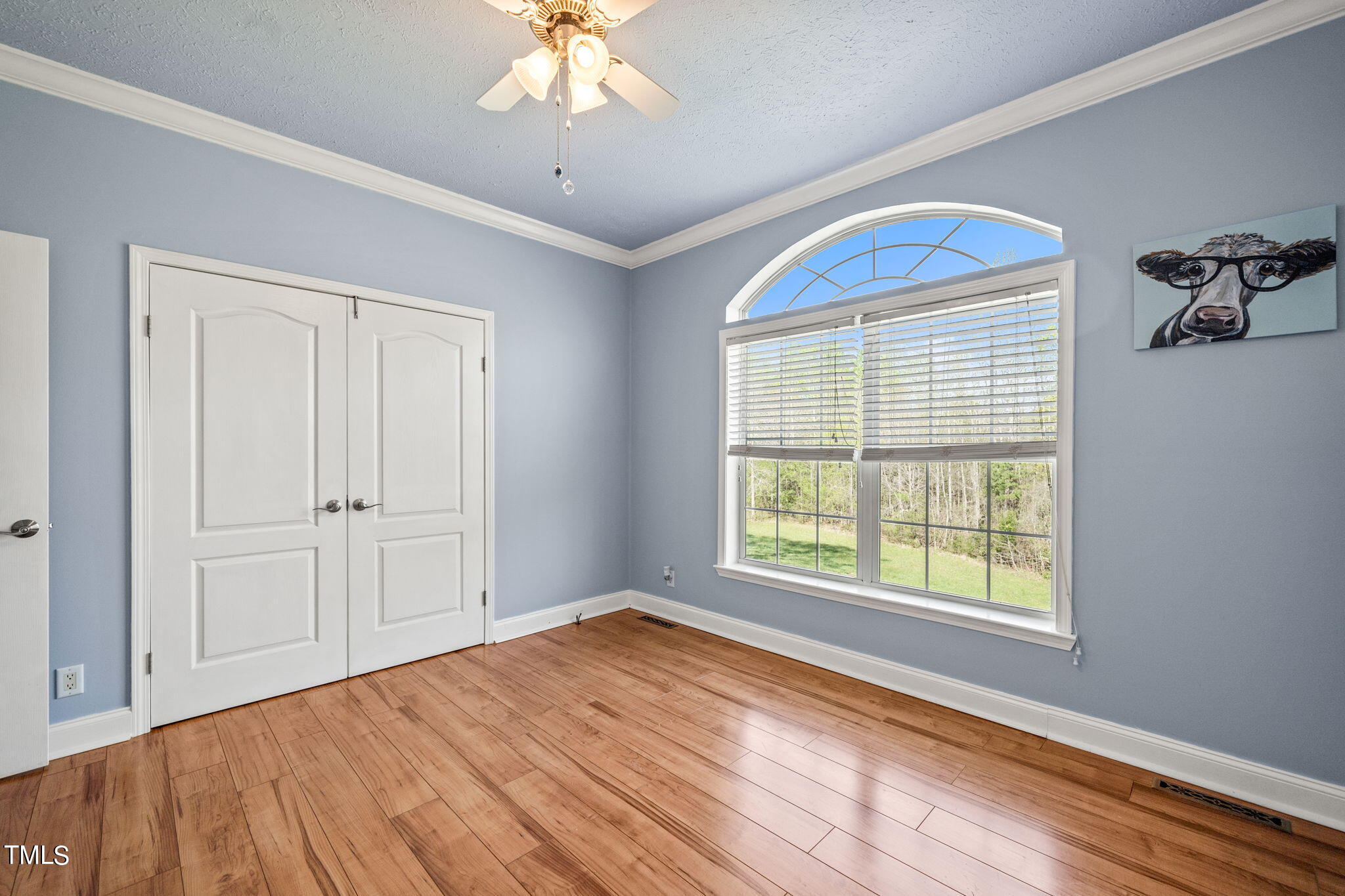 155 Esnon Road Chase City, VA 23924 - Photo 16 of 35 a view of an empty room with a window and wooden floor
