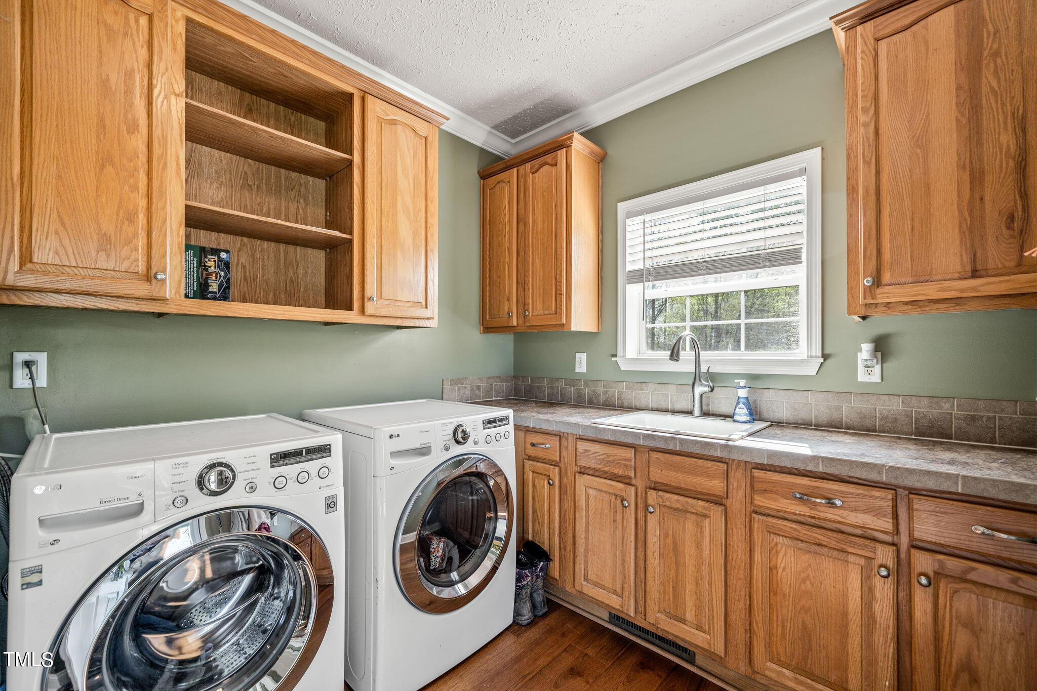 155 Esnon Road Chase City, VA 23924 - Photo 10 of 35 a utility room with sink dryer and washer