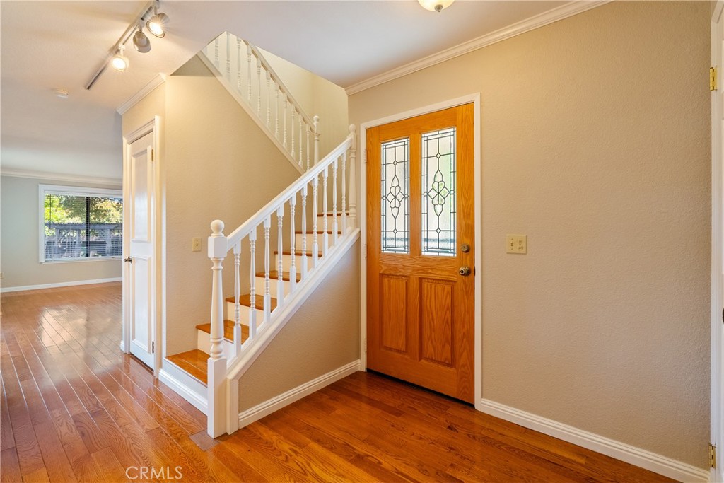 6815 Santa Lucia Road, Unit 5 Atascadero, CA 93422 - Photo 6 of 44 Come in! There is a lovely entry with a coat closet on one side and extra storage under the stairway for convenience. Fresh paint and new carpet upstairs recently added.