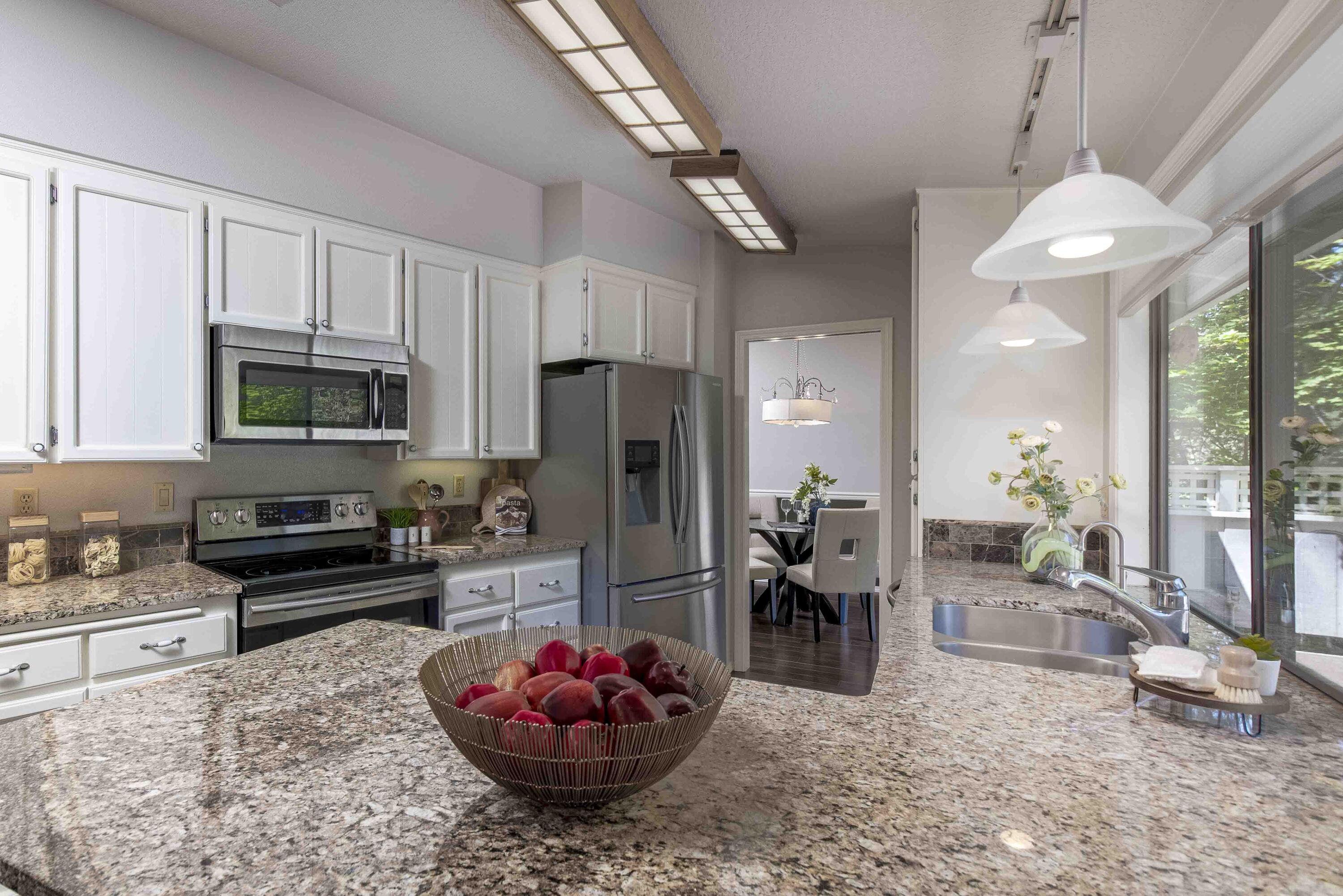 20410 Mainline Road Bend, OR 97702 - Photo 2 of 33 Wonderful spacious kitchen with stainless steel appliances and granite counters
