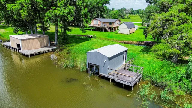 a view of a house with a yard porch and sitting area