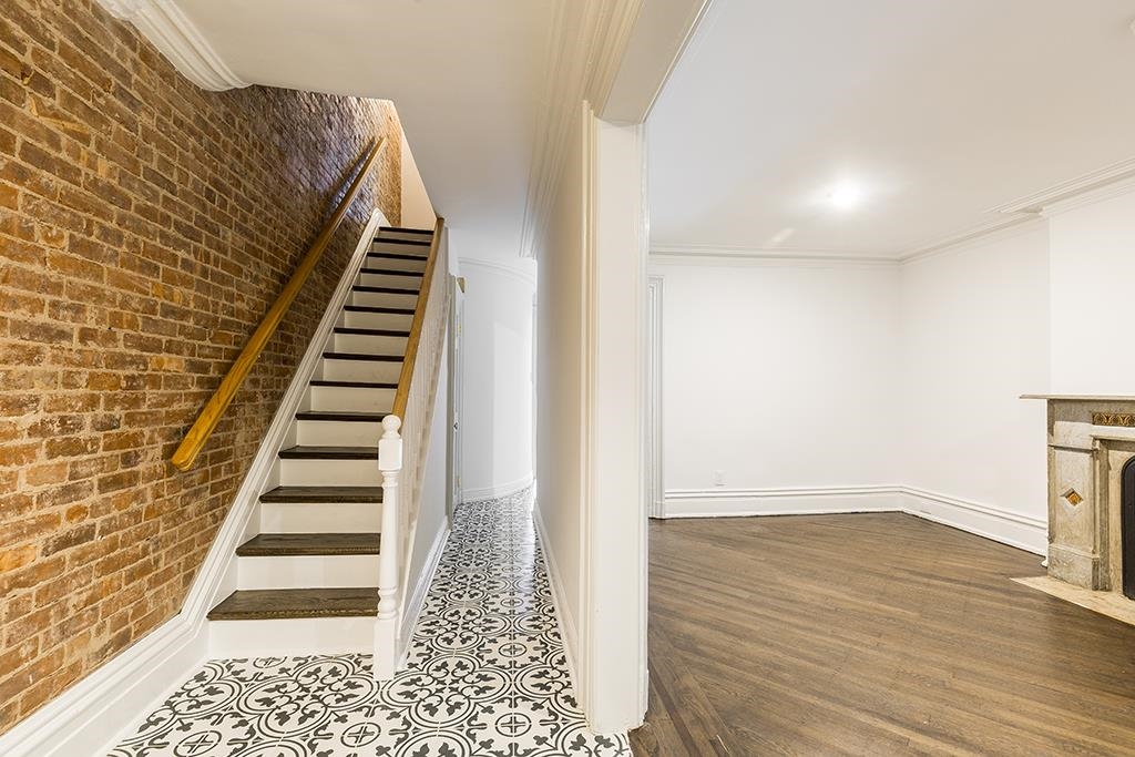 118 Mercer Street Jersey City, NJ 07302 - Photo 14 of 33 a view of an entryway with wooden floor