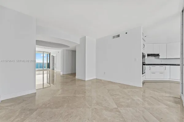 a large kitchen with cabinets