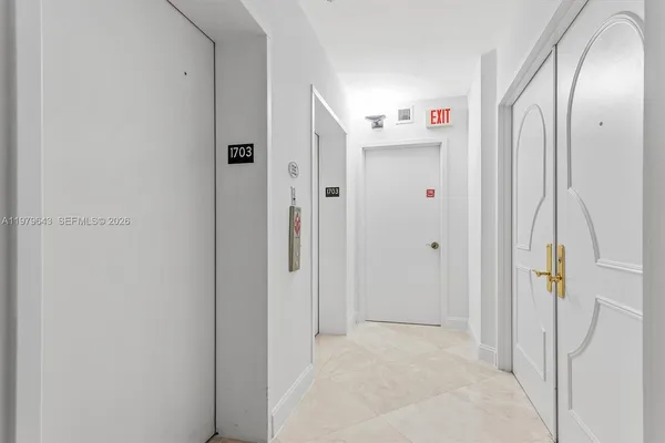 a view of a patio with table and chairs potted plants