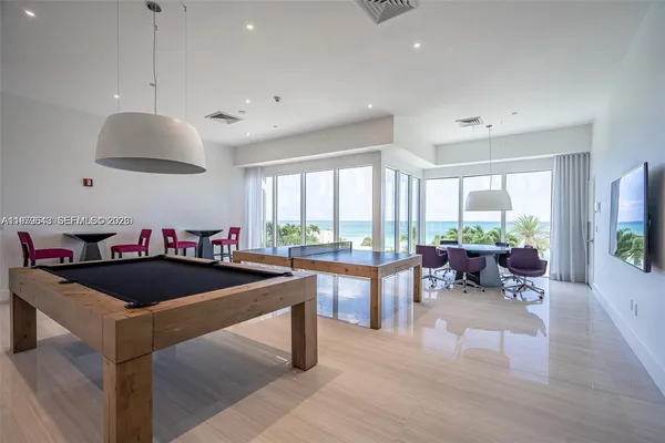 a bed room with a bed and a book shelf