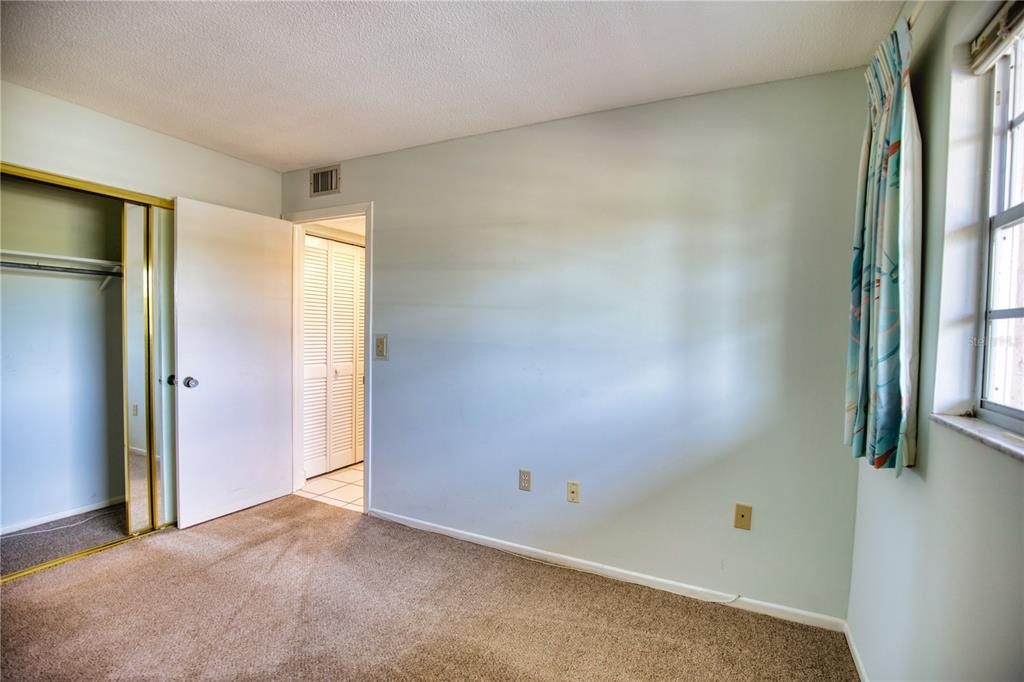 102 Capri Isles Boulevard, Unit 207 Venice, FL 34292 - Photo 20 of 25 a view of an empty room