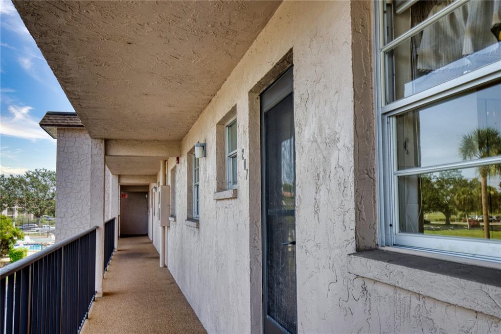 102 Capri Isles Boulevard, Unit 207 Venice, FL 34292 - Photo 4 of 25 a view of a house with a hallway