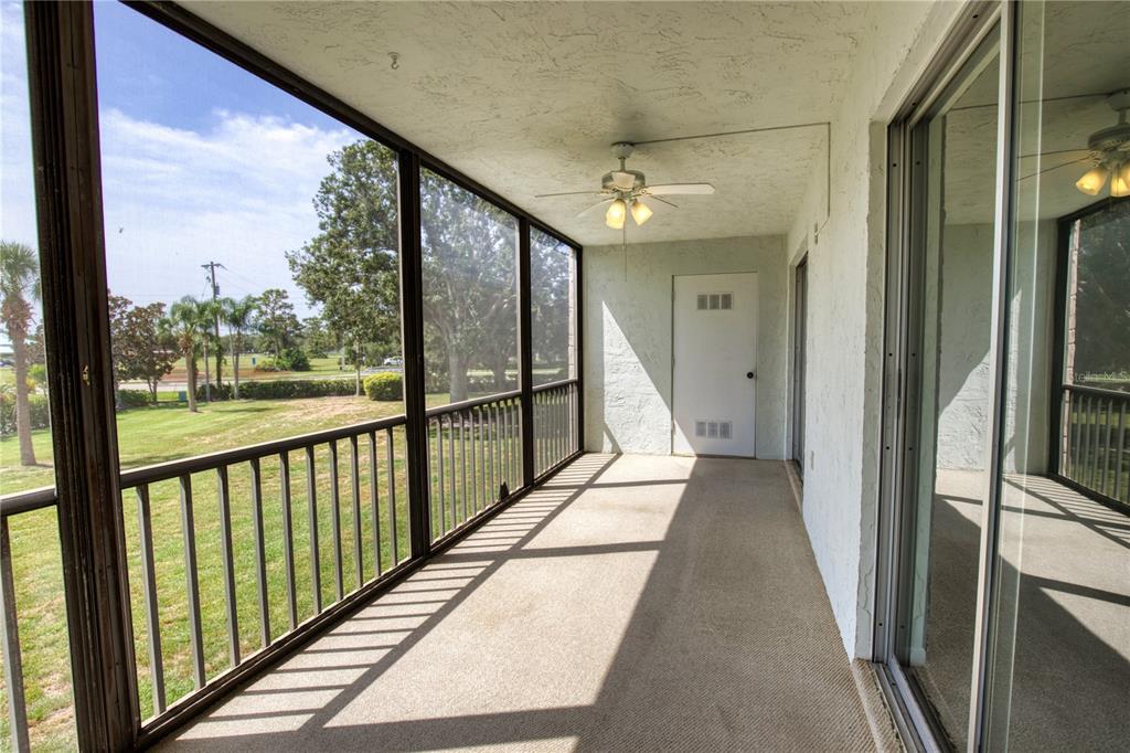 102 Capri Isles Boulevard, Unit 207 Venice, FL 34292 - Photo 10 of 25 a view of a city from a balcony