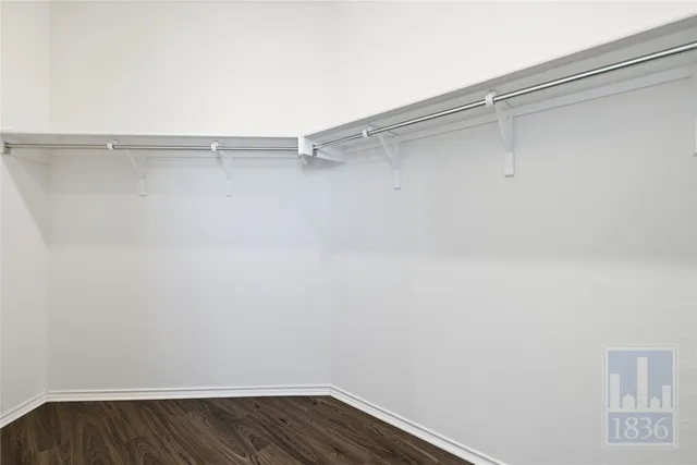 a view of an empty walk in closet