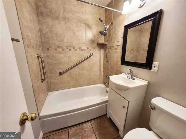 an empty room with a fireplace