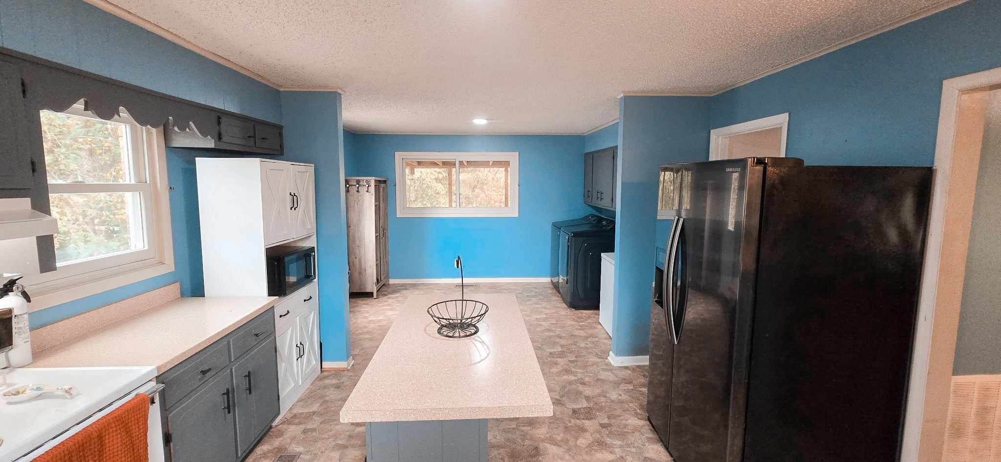 936 Ridge Road Quebeck, TN 38579 - Photo 16 of 32 a kitchen with stainless steel appliances granite countertop a refrigerator a stove and a sink