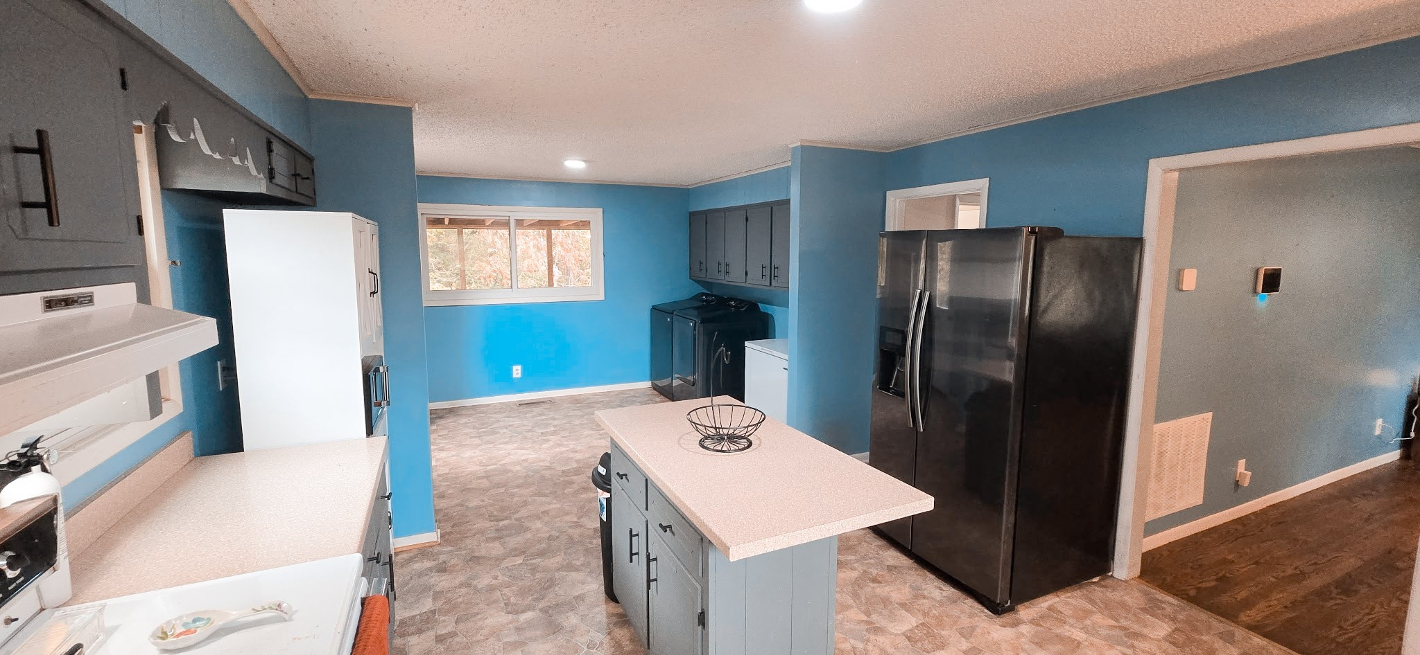 936 Ridge Road Quebeck, TN 38579 - Photo 19 of 32 a kitchen with a refrigerator and countertop