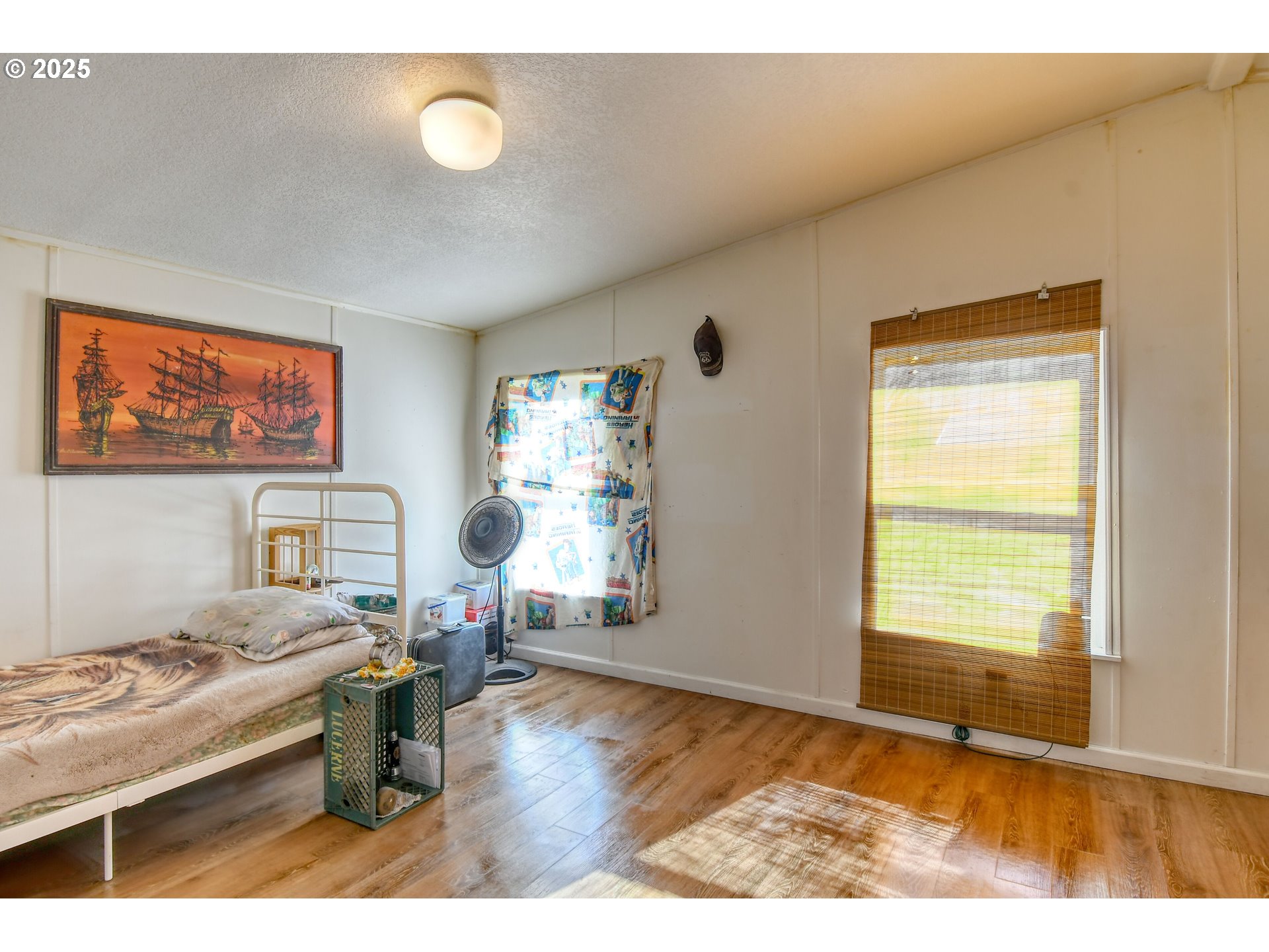 424 East High Street Athena, OR 97813 - Photo 19 of 40 a living room with furniture and a window