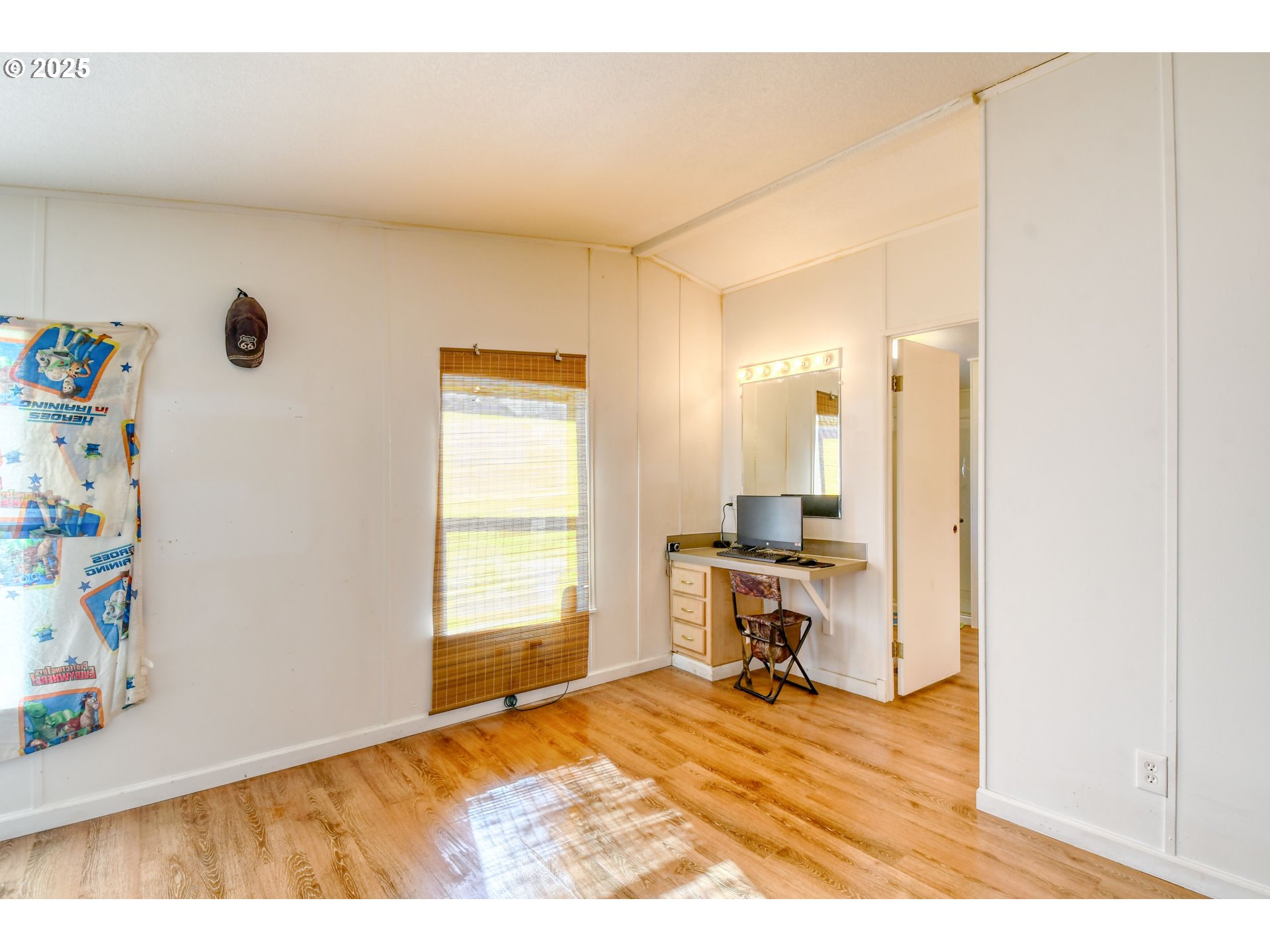 424 East High Street Athena, OR 97813 - Photo 22 of 40 a bedroom with a bed and a window