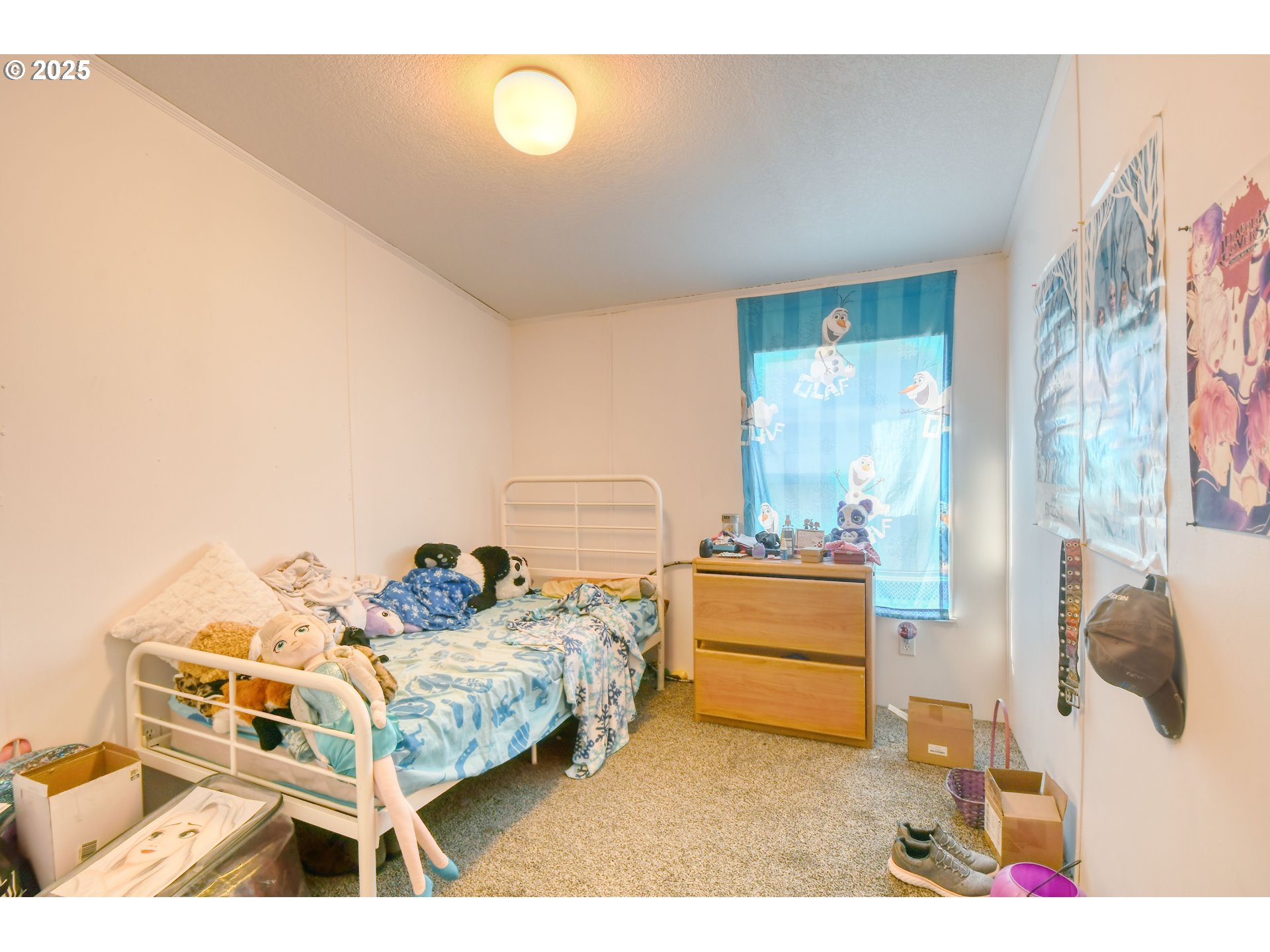 424 East High Street Athena, OR 97813 - Photo 27 of 40 a bedroom with furniture and a wooden floor