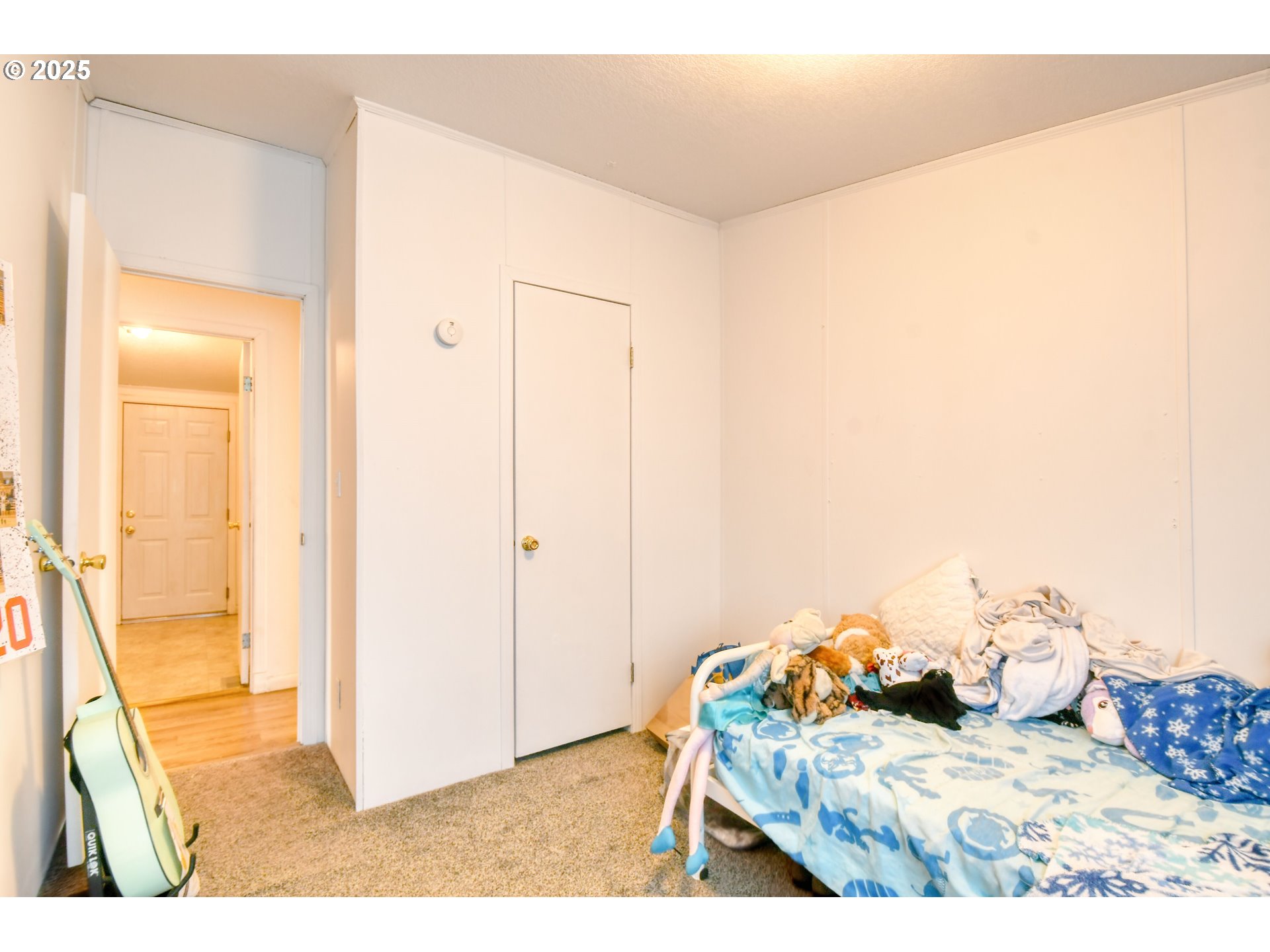 424 East High Street Athena, OR 97813 - Photo 28 of 40 a bed room with a bed and a painting